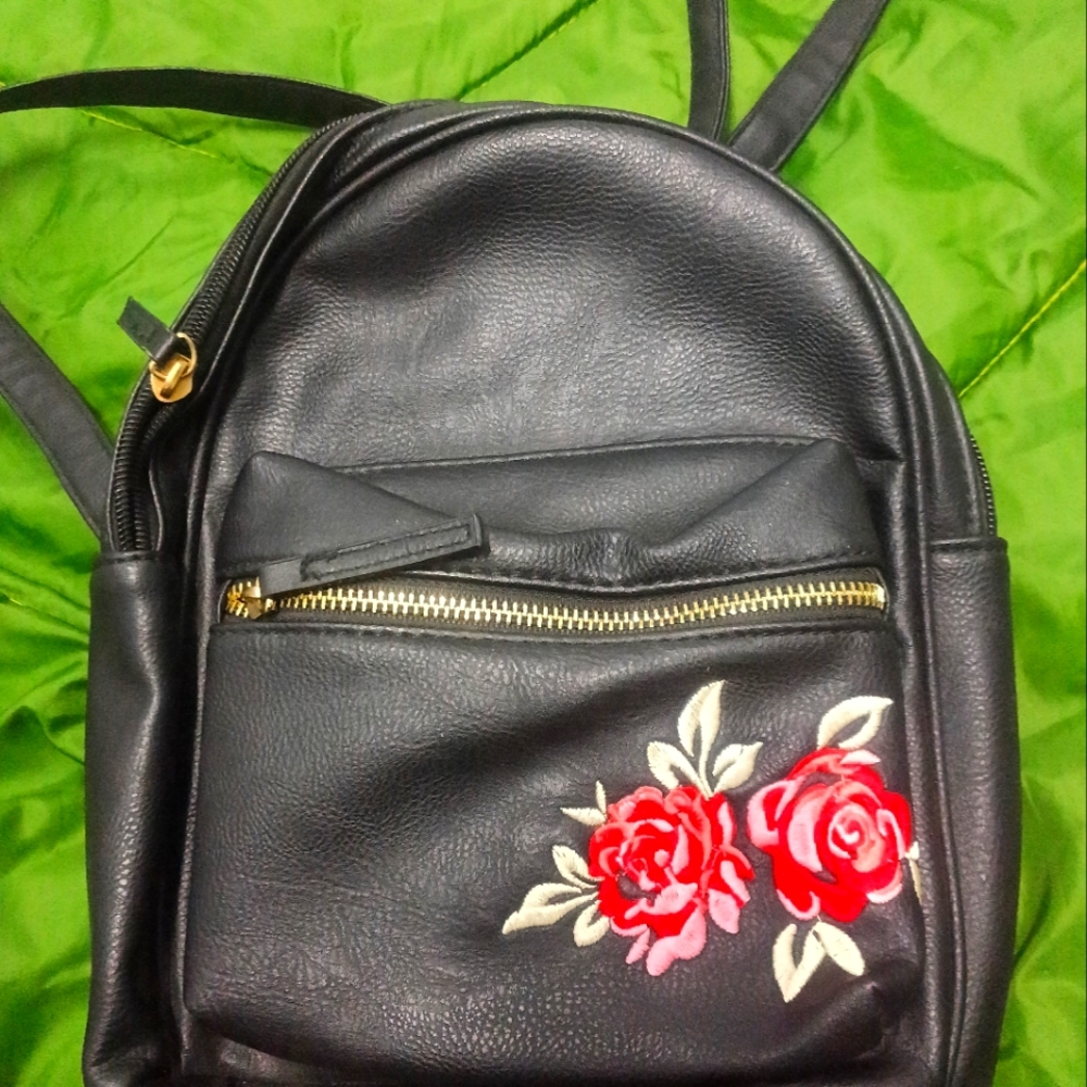 Elegant Black Backpack with Red Floral Design